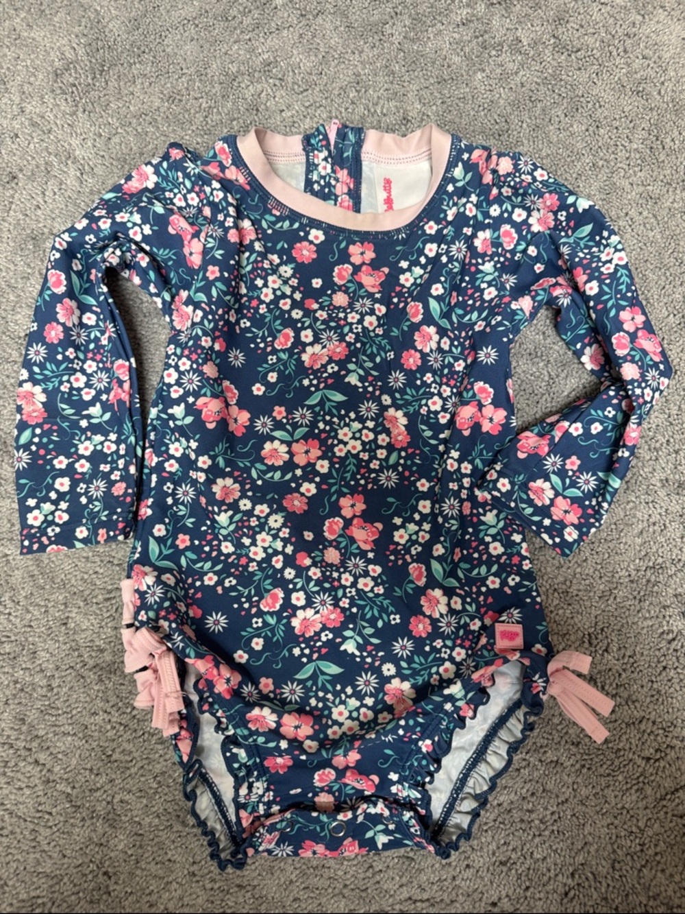 Ruffle Butts Navy Floral Long-Sleeve One-Piece Swimsuit with Pink Accents 2T